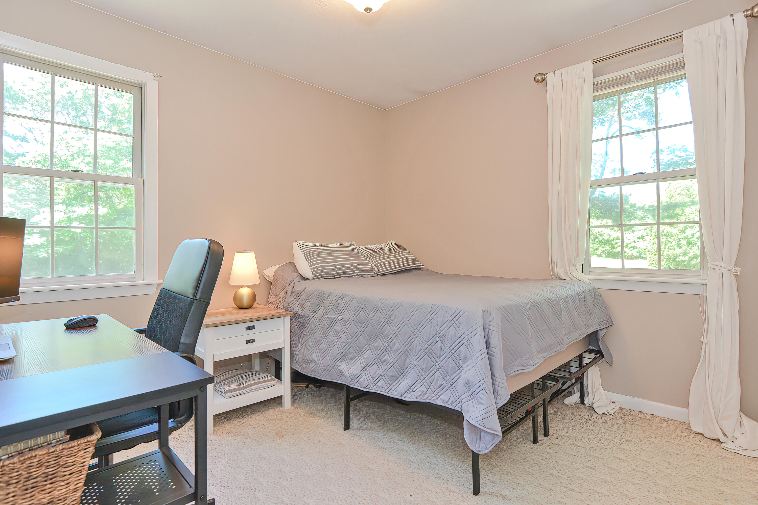 2 King Arthurs Way Buzzards Bay, MA 02532 - Photo 14 of 29 a bedroom with a bed a table and chair