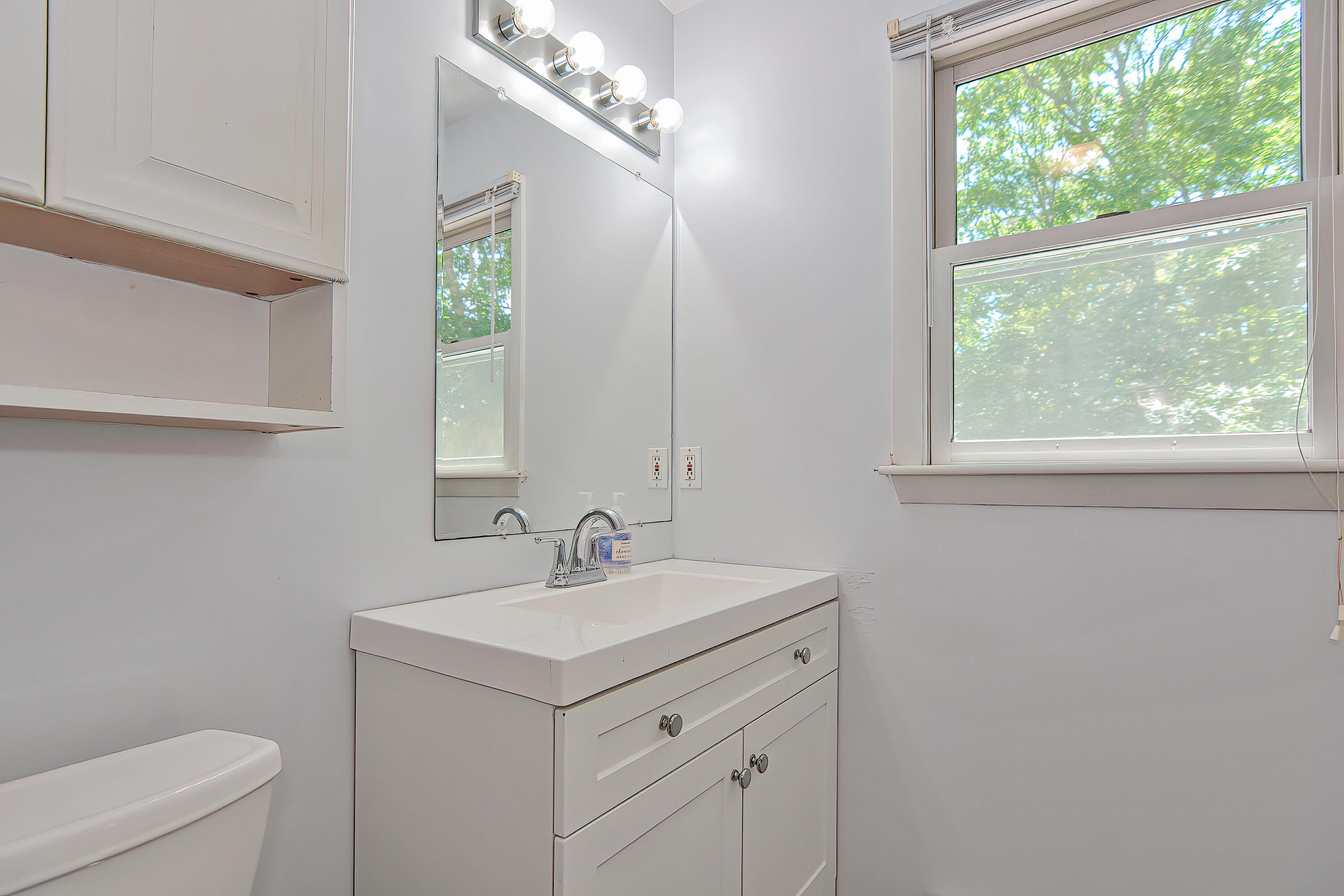 2 King Arthurs Way Buzzards Bay, MA 02532 - Photo 20 of 29 a bathroom with a sink a toilet and a mirror
