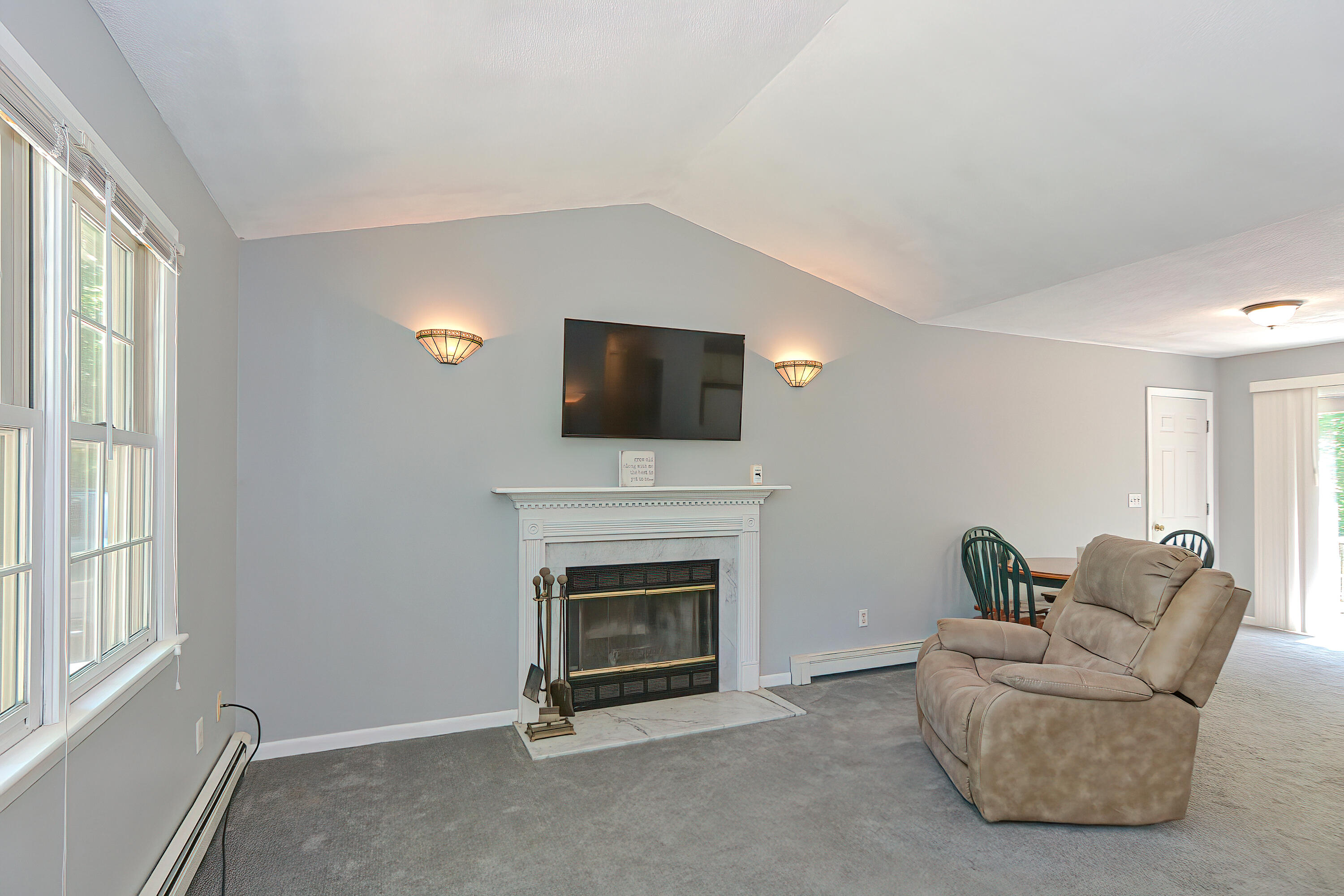 2 King Arthurs Way Buzzards Bay, MA 02532 - Photo 6 of 29 a living room with furniture and a fireplace