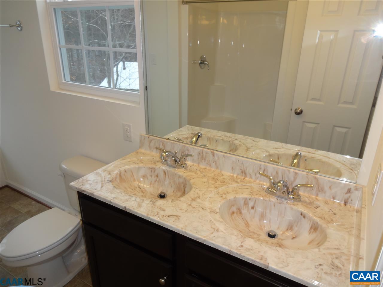 301 East Daffodil Road Ruckersville, VA 22968 - Photo 11 of 26 a bathroom with a sink and a toilet