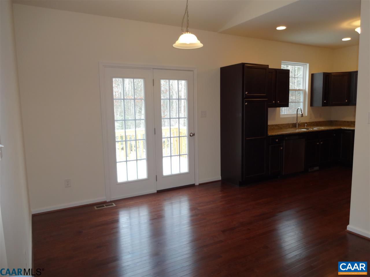 301 East Daffodil Road Ruckersville, VA 22968 - Photo 6 of 26 a view of a kitchen with a sink and a window