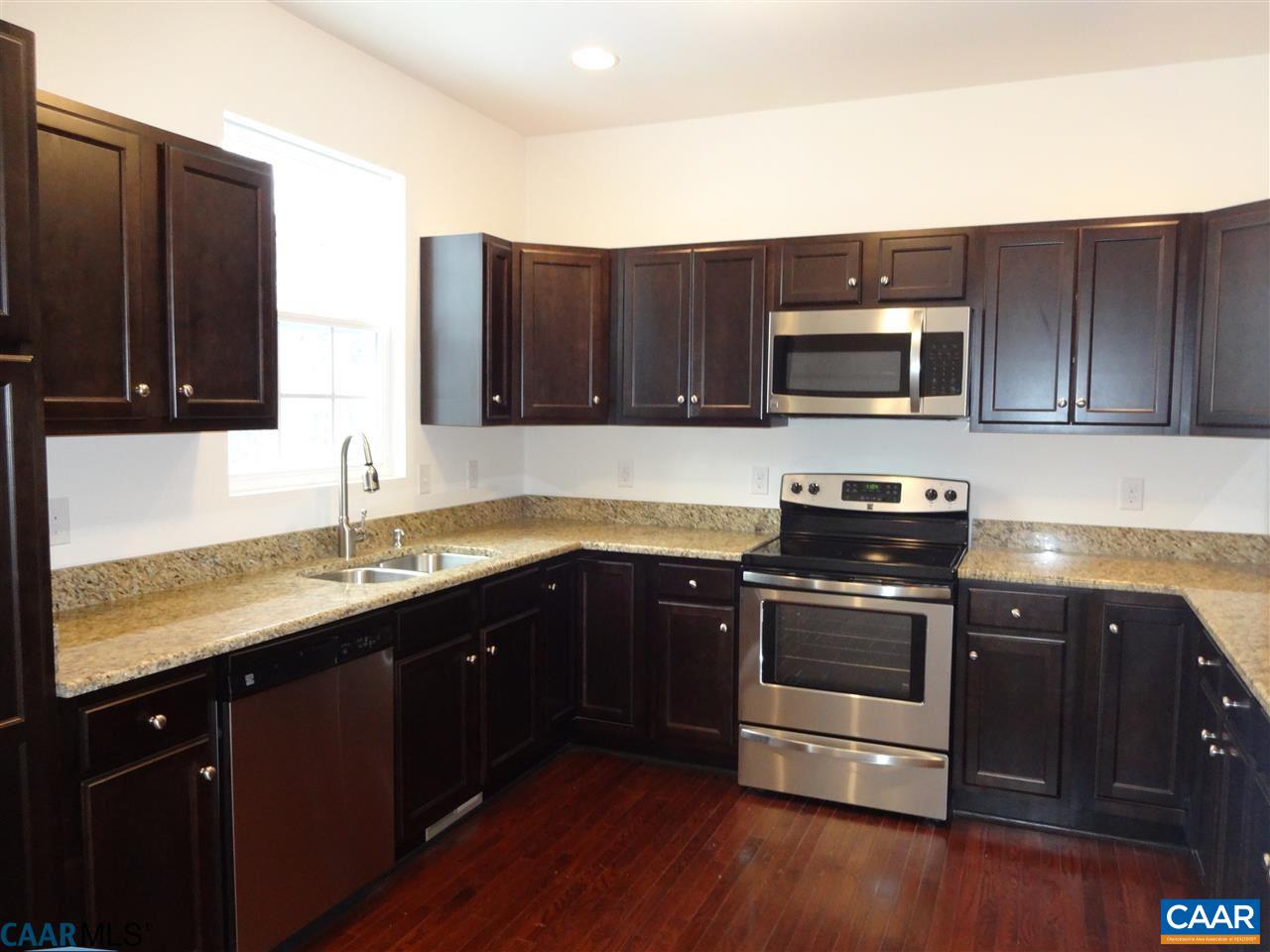 301 East Daffodil Road Ruckersville, VA 22968 - Photo 8 of 26 a kitchen with a sink and steel appliances