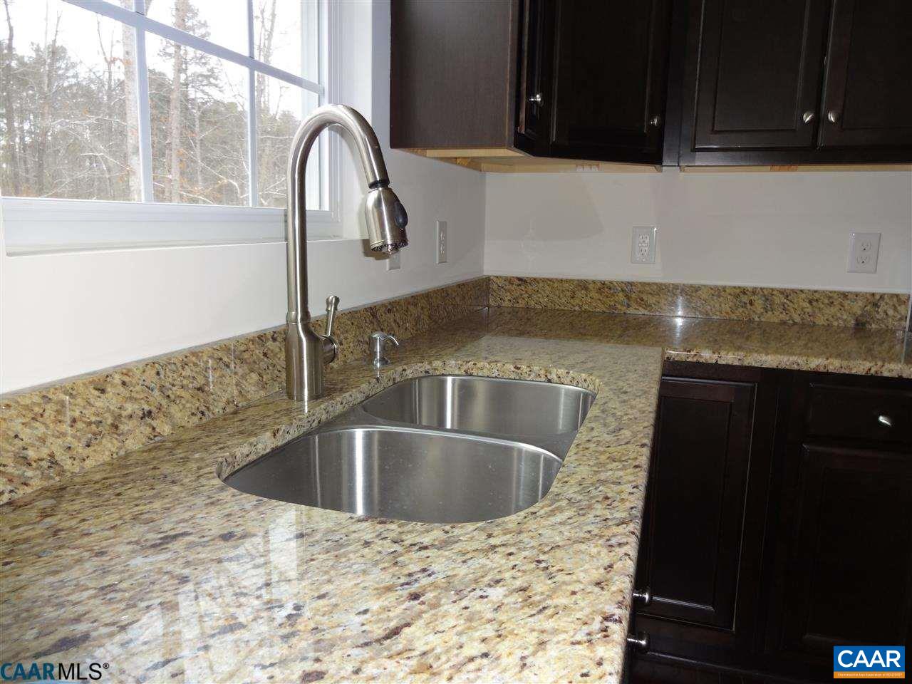 301 East Daffodil Road Ruckersville, VA 22968 - Photo 9 of 26 a close view of a sink and dishwasher with kitchen island