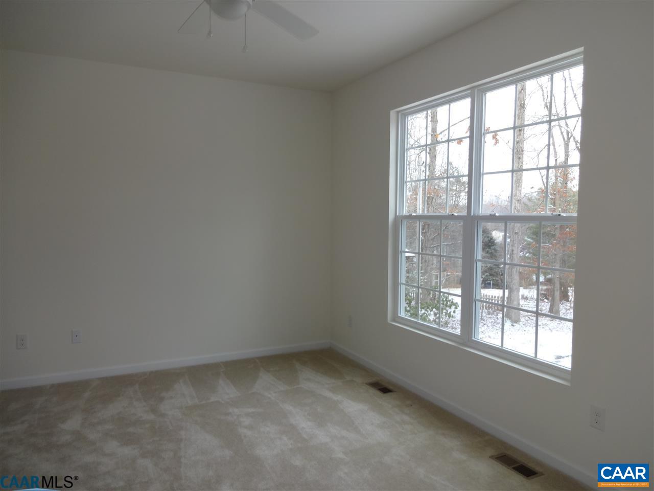 301 East Daffodil Road Ruckersville, VA 22968 - Photo 10 of 26 an empty room with windows
