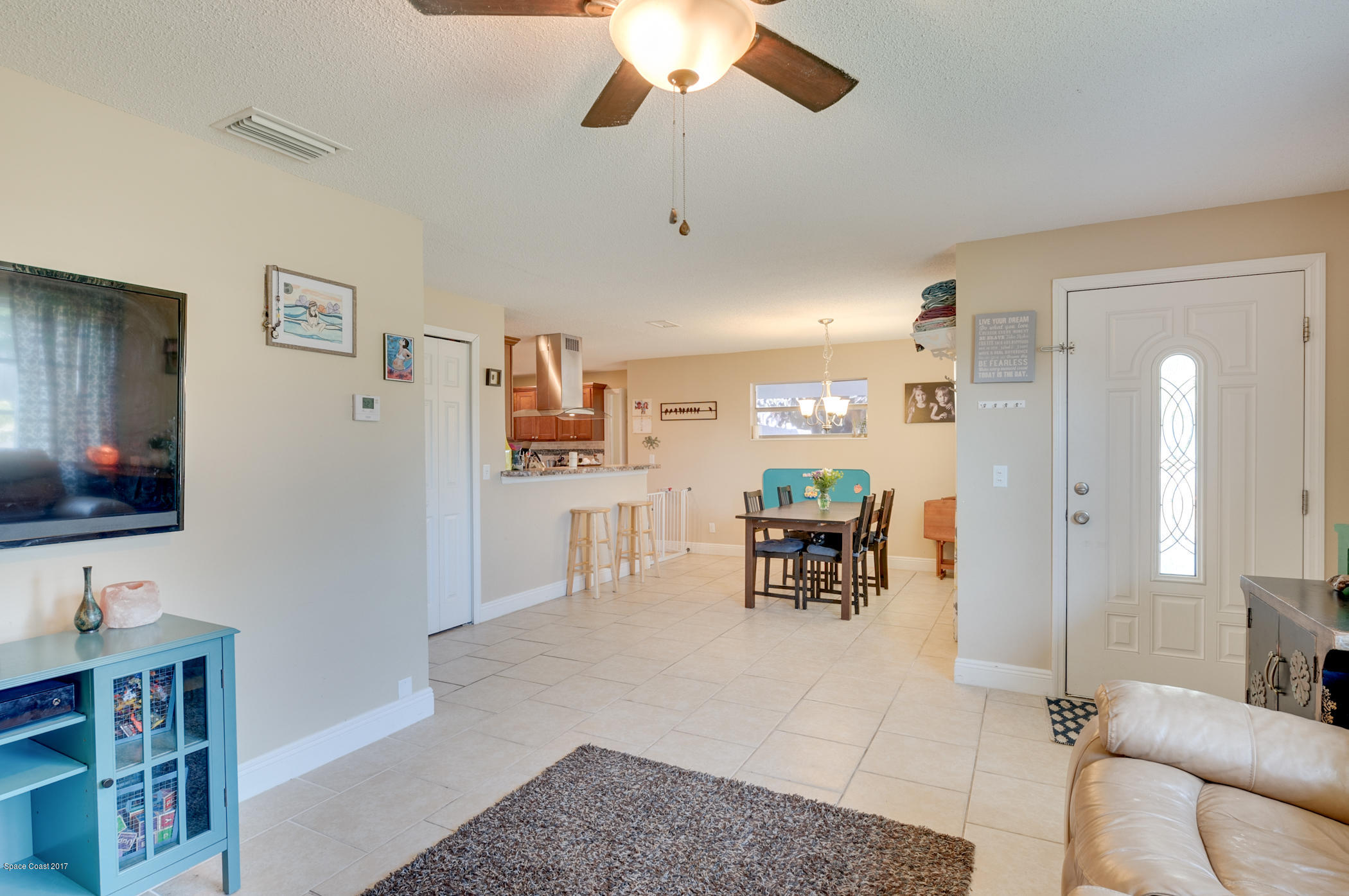 2261 Montgomery Road Melbourne, FL 32935 - Photo 13 of 36 Dining and Foyer