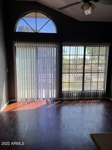 a kitchen with a refrigerator and a sink
