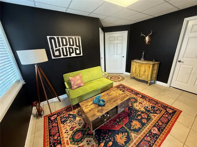 a living room with rug