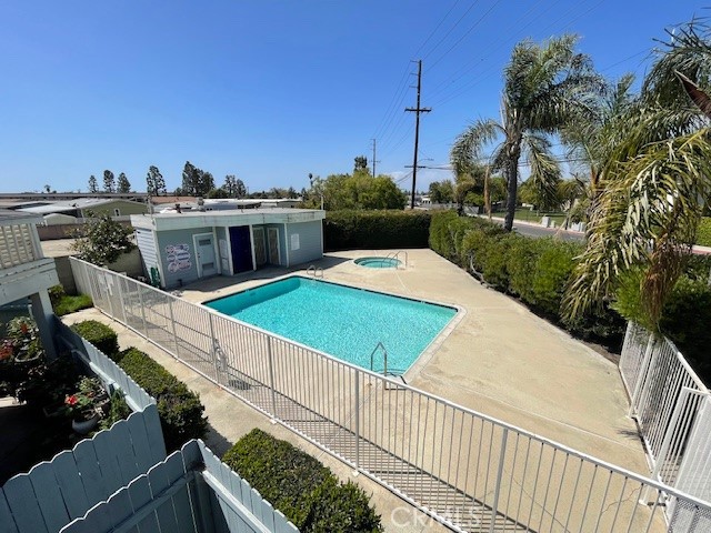 7652 Cerritos Avenue, Unit E Stanton, CA 90680 - Photo 13 of 14 a view of a chairs and table on the terrace