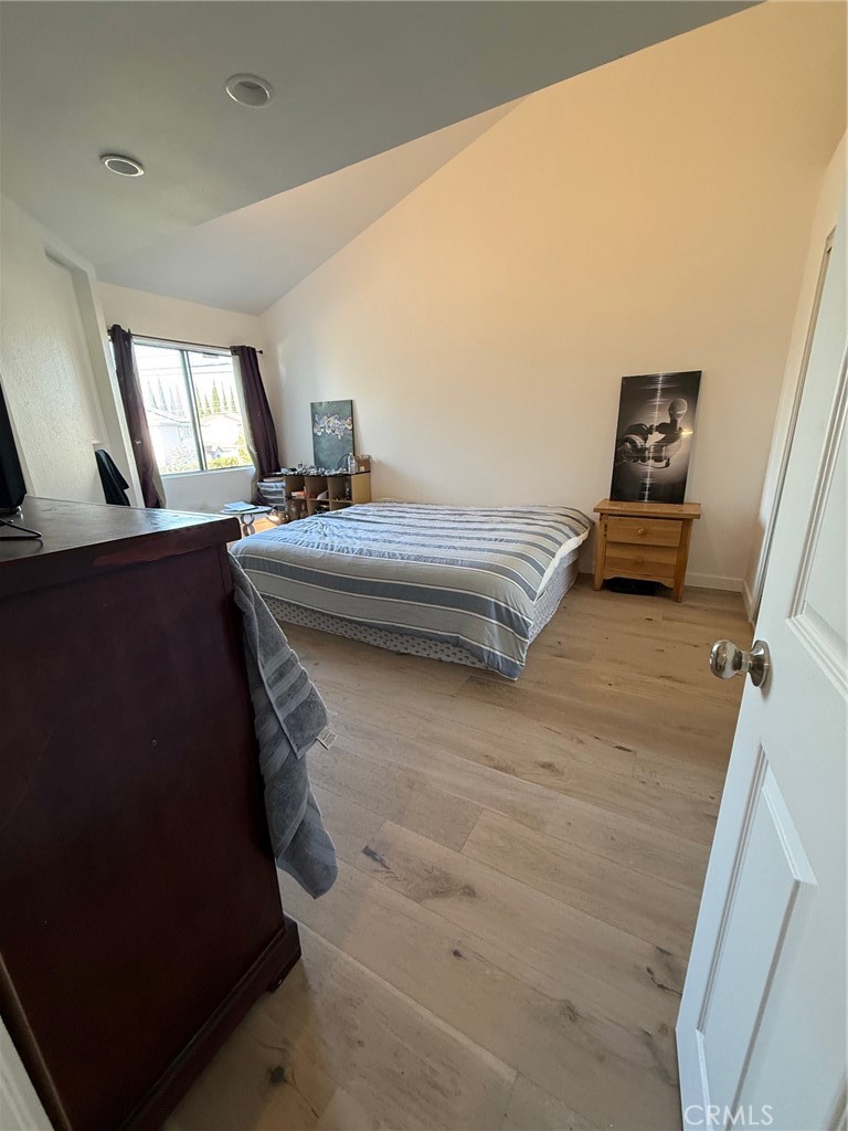 7652 Cerritos Avenue, Unit E Stanton, CA 90680 - Photo 5 of 14 a bedroom with a bed and window