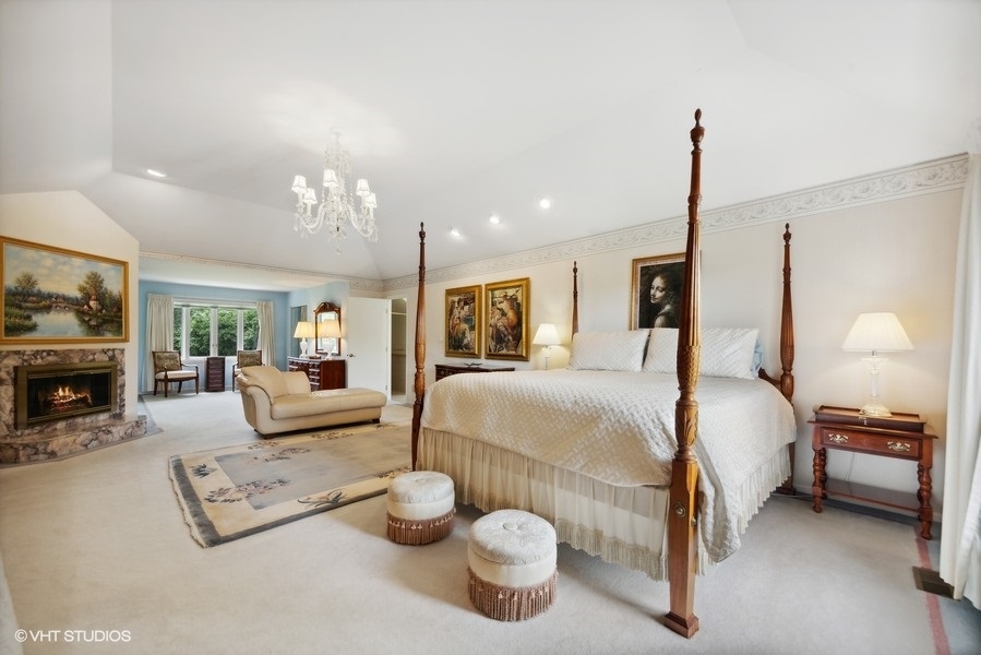 2 Keri Lane Burr Ridge, IL 60527 - Photo 18 of 24 a bedroom with a bed and window