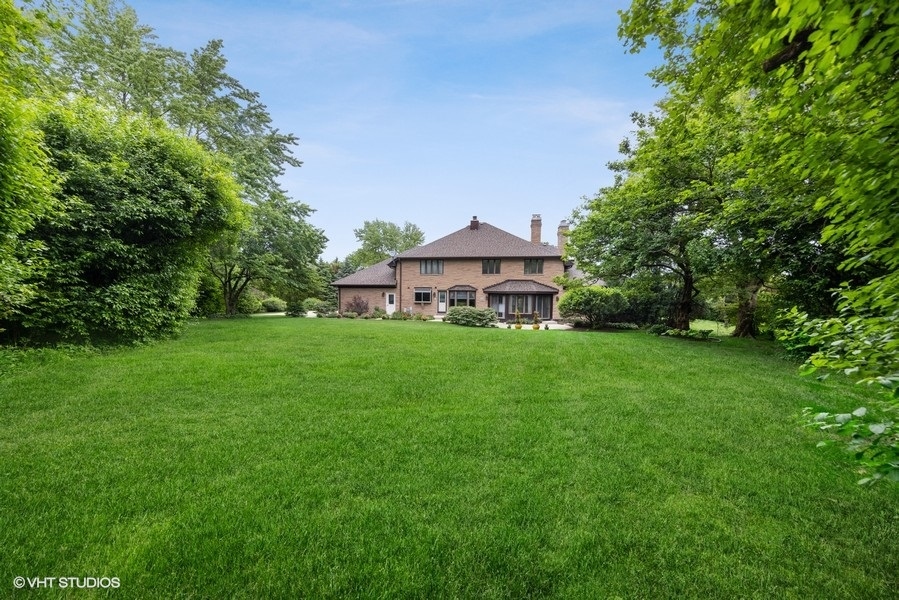 2 Keri Lane Burr Ridge, IL 60527 - Photo 20 of 24 a front view of a house with garden