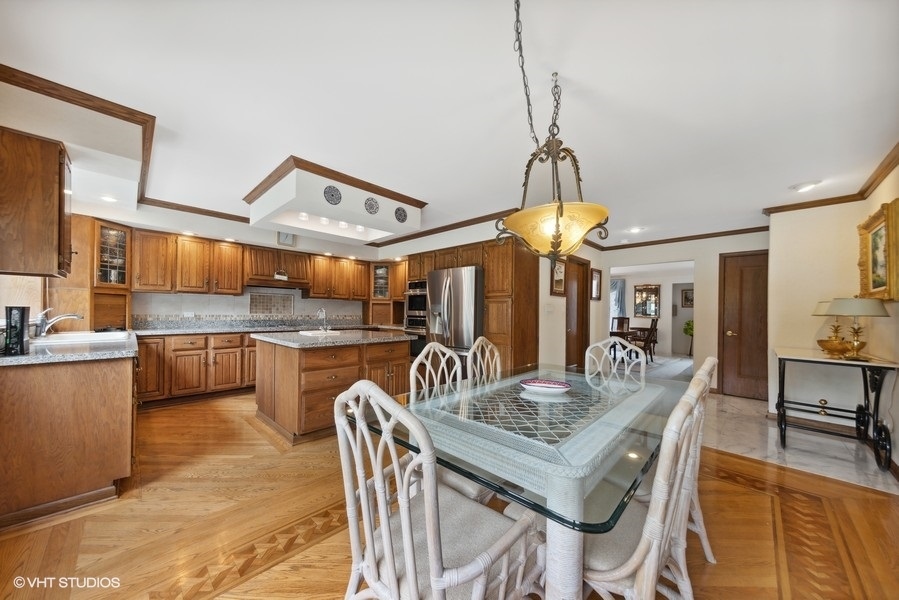 2 Keri Lane Burr Ridge, IL 60527 - Photo 8 of 24 a kitchen with granite countertop lots of counter top space