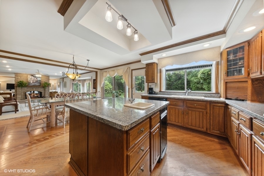 2 Keri Lane Burr Ridge, IL 60527 - Photo 9 of 24 a kitchen with counter top space and sink