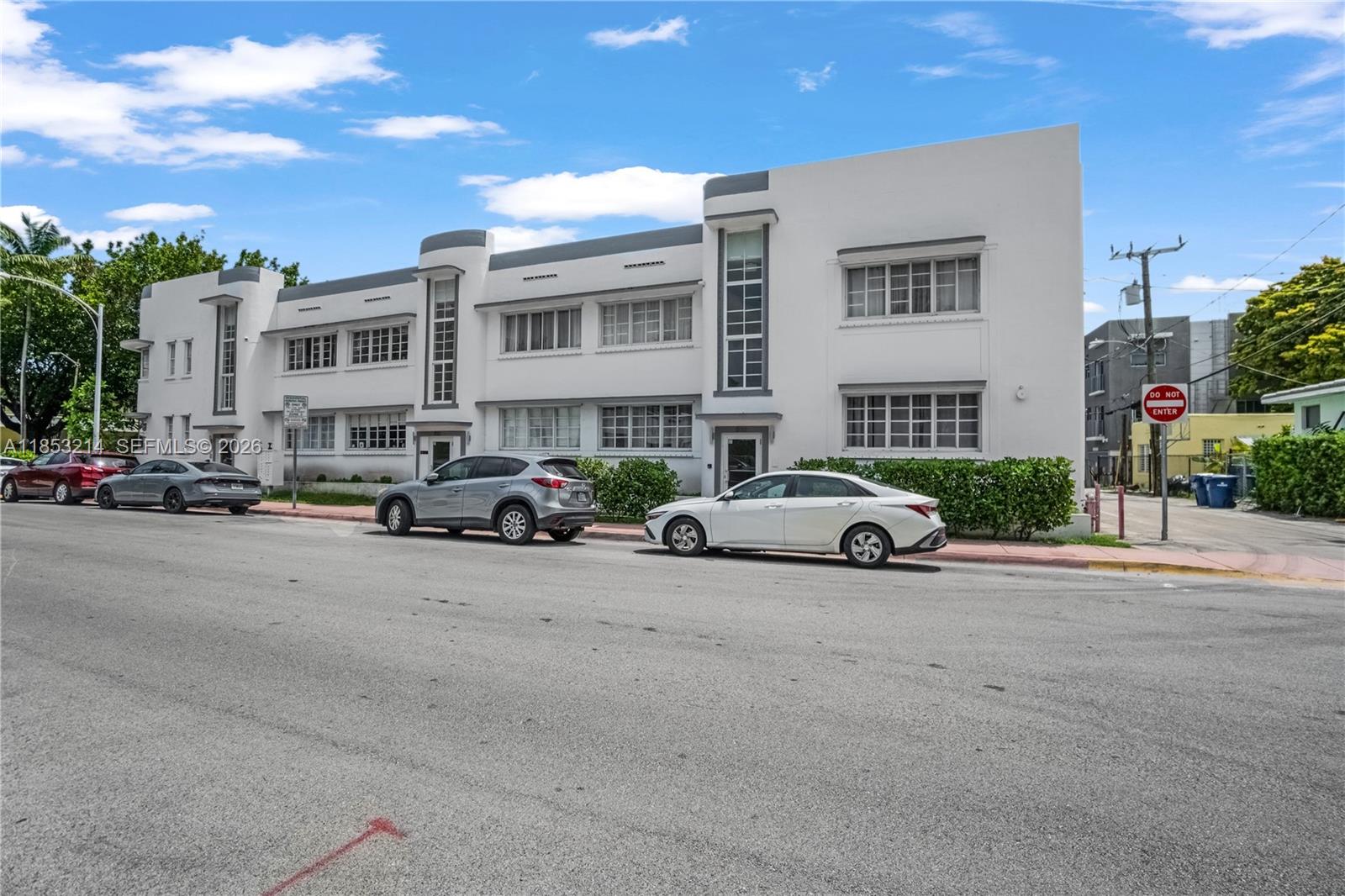 810 7th Street, Unit 107 Miami Beach, FL 33139 - Photo 2 of 36 a view of the street with a cars parked in front of it