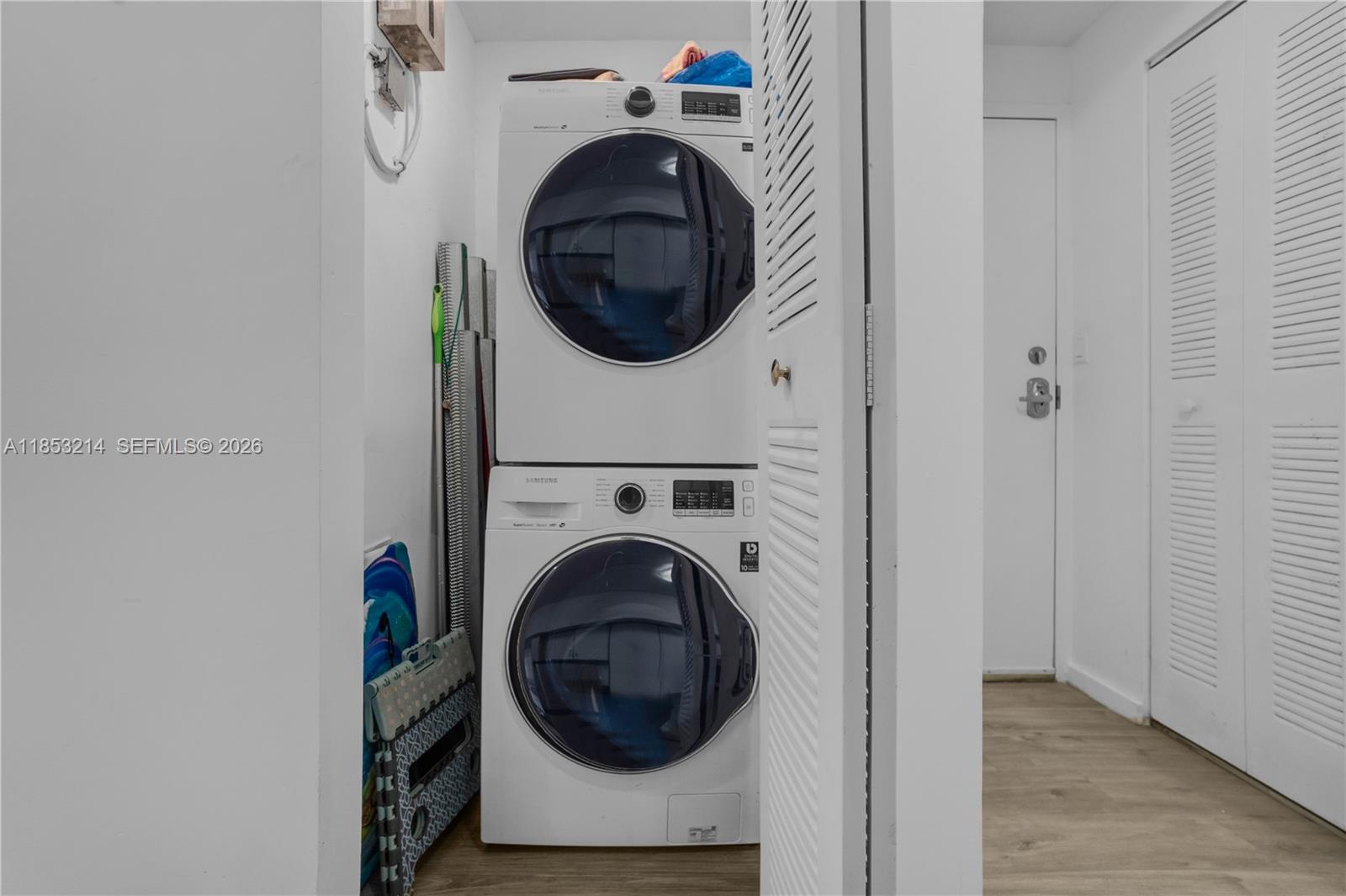 810 7th Street, Unit 107 Miami Beach, FL 33139 - Photo 35 of 36 a utility room with dryer and washer