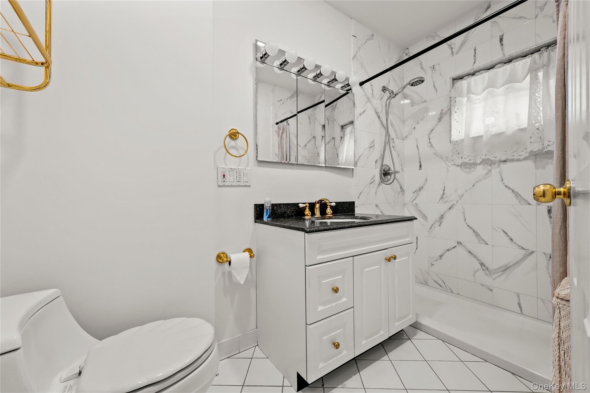 54 Edgewood Road Port Washington, NY 11050 - Photo 10 of 25 first floor bathroom