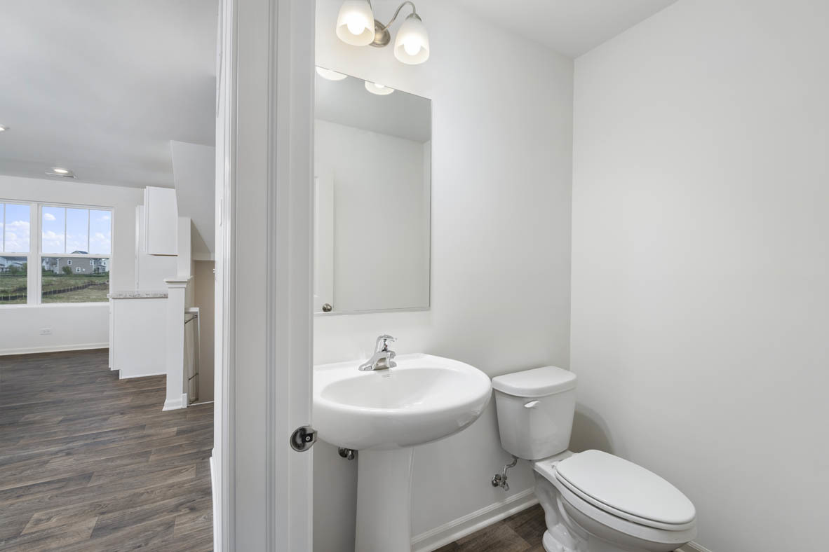 3815 Currant Lane Elgin, IL 60124 - Photo 13 of 21 a bathroom with a sink a toilet and shower