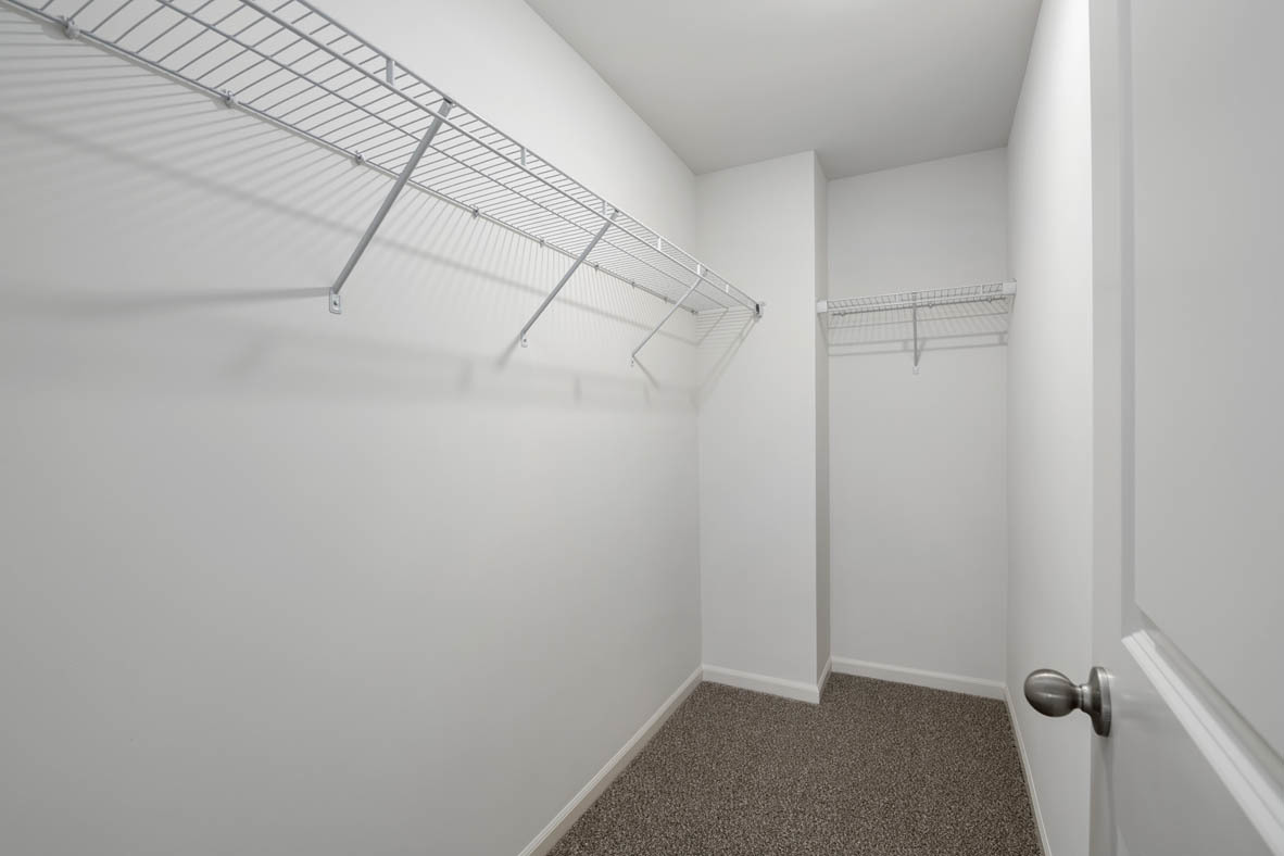 3815 Currant Lane Elgin, IL 60124 - Photo 15 of 21 a view of a room with racks on the wall