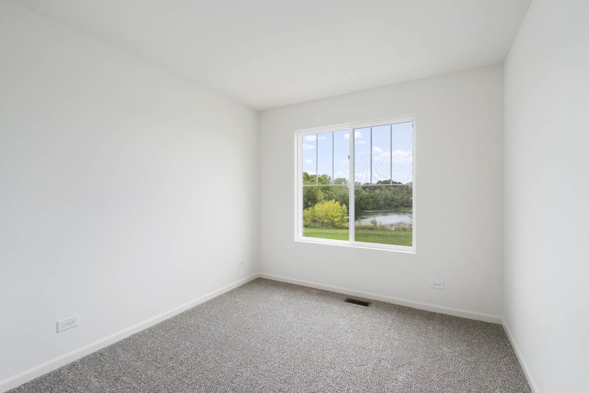 3815 Currant Lane Elgin, IL 60124 - Photo 18 of 21 an empty room with windows