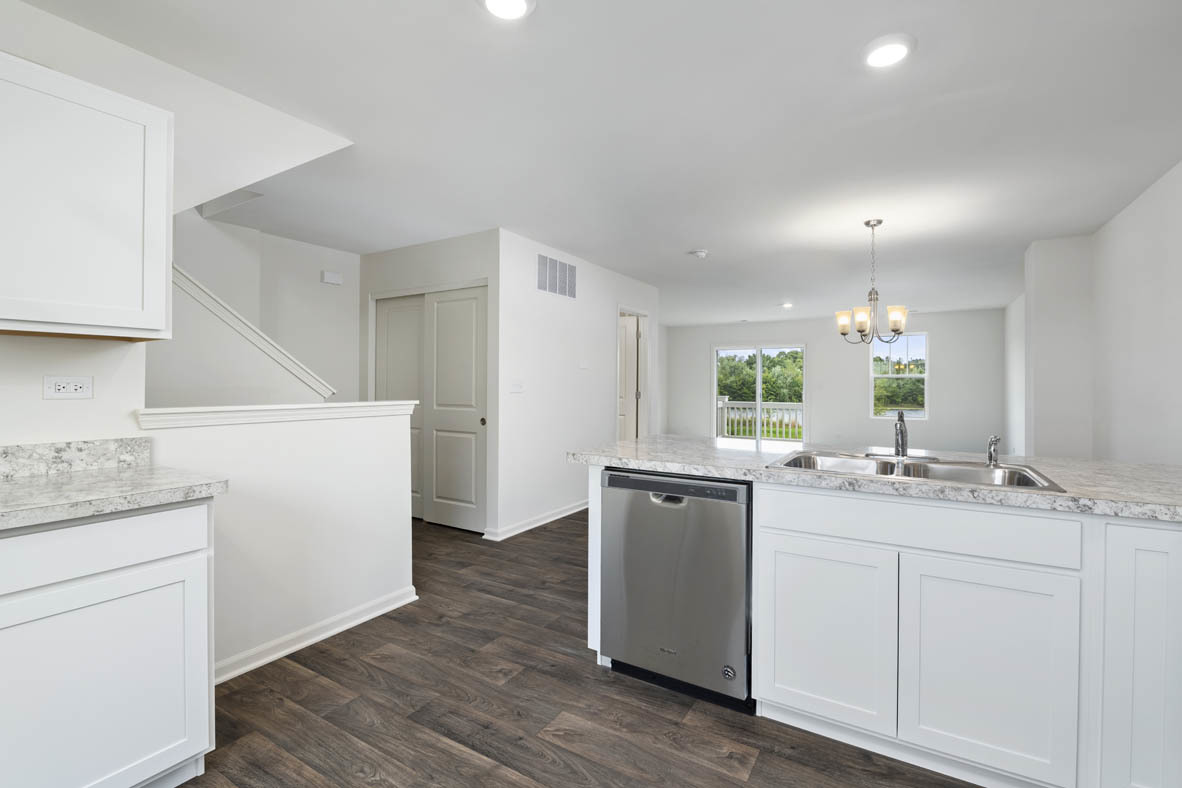 3815 Currant Lane Elgin, IL 60124 - Photo 9 of 21 a kitchen with a sink stove and cabinets