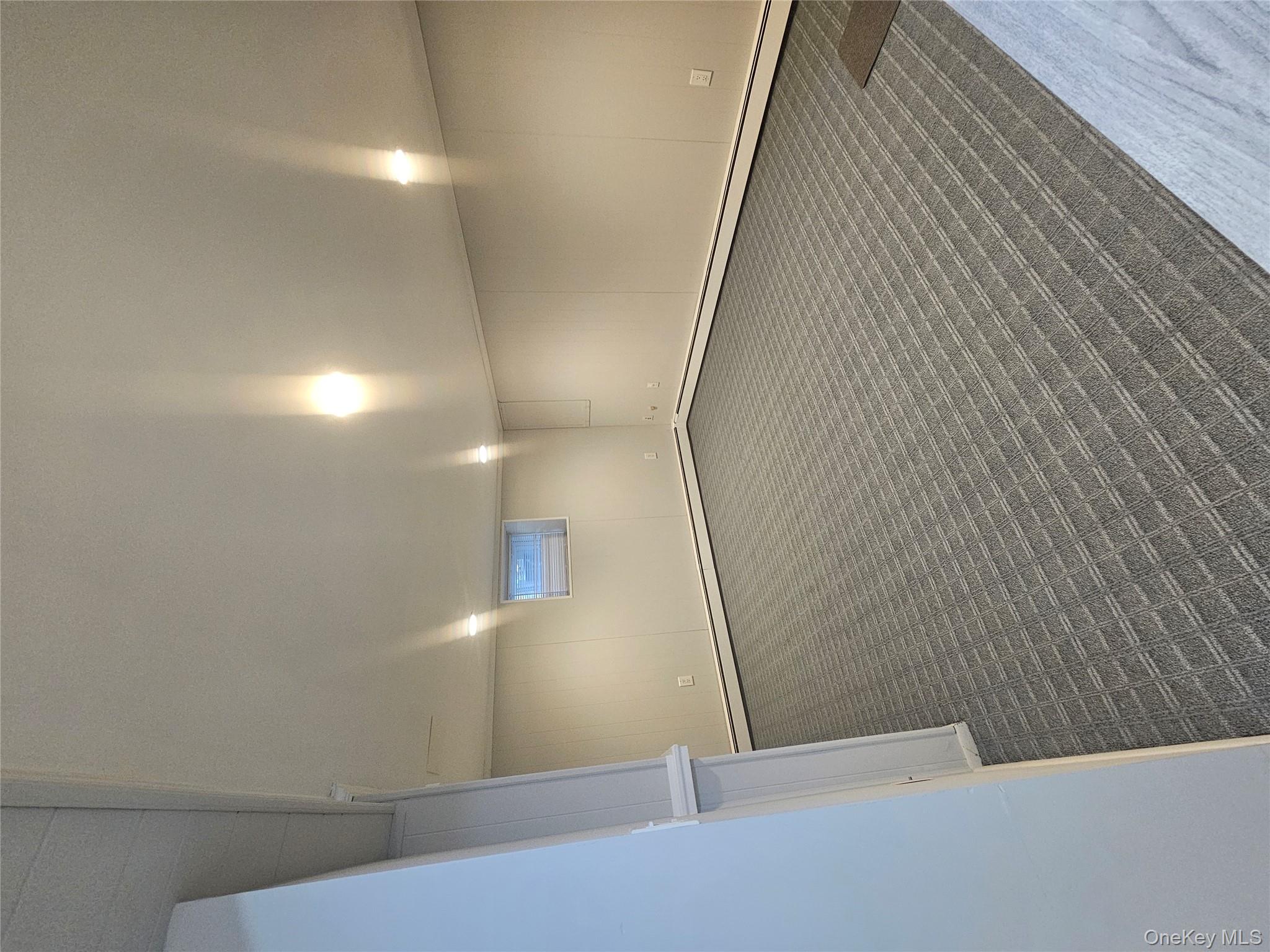 43 Hartman Hill Road Huntington, NY 11743 - Photo 5 of 10 wooden floor in an empty room with a window