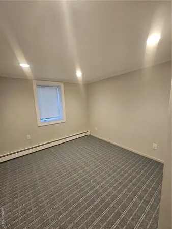 an empty room with a workbench