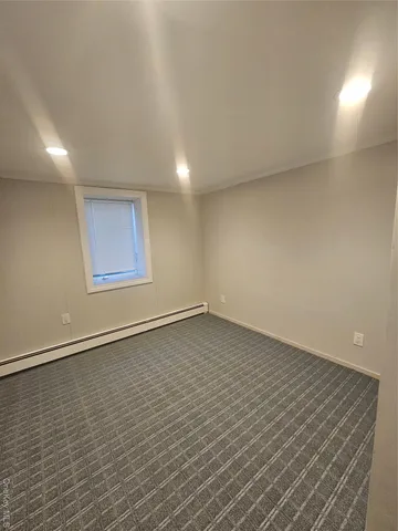 an empty room with a workbench