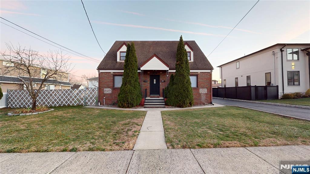 204 Philip Avenue, Unit 2 Elmwood Park, NJ 07407 - Photo 8 of 8 a view of a house with a yard