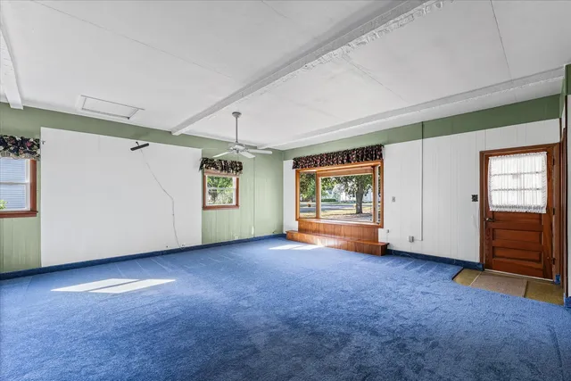 an empty room with windows