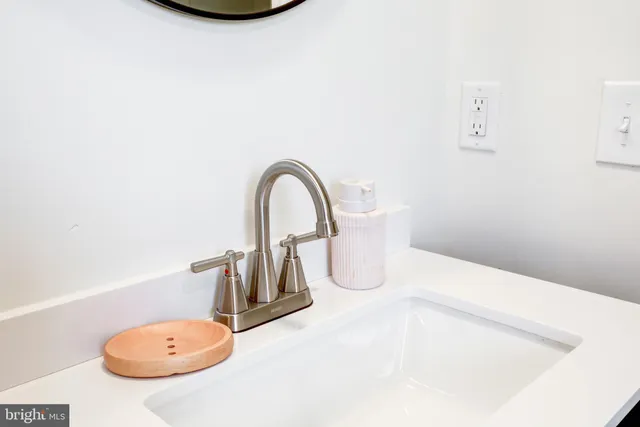 a picture of a bath tub sitting in a bathroom