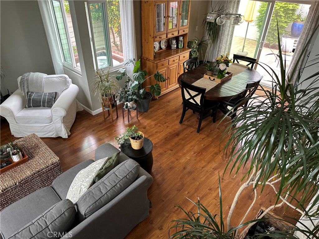39 Wintermist Irvine, CA 92614 - Photo 11 of 14 a living room with furniture and a floor to ceiling window