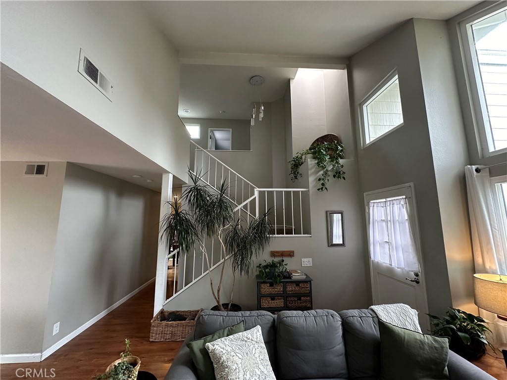 39 Wintermist Irvine, CA 92614 - Photo 13 of 14 a living room with furniture and a flat screen tv