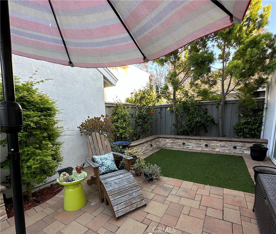39 Wintermist Irvine, CA 92614 - Photo 14 of 14 a view of a patio with swimming pool table and chairs