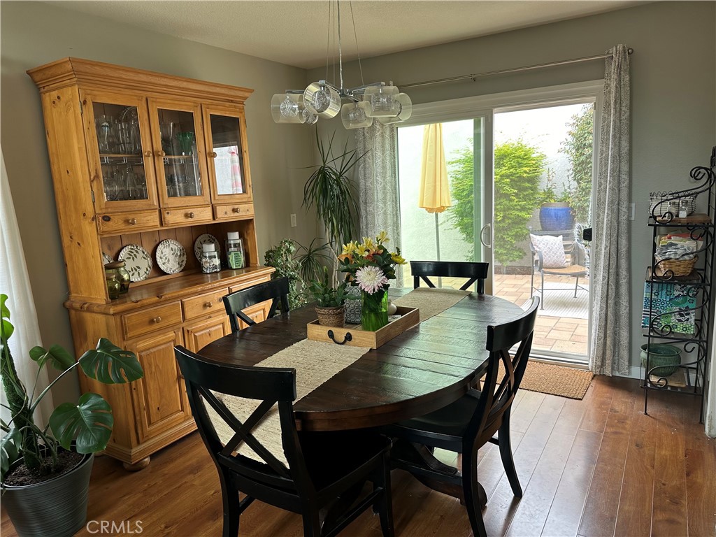 39 Wintermist Irvine, CA 92614 - Photo 3 of 14 a view of a dining room with furniture window and wooden floor