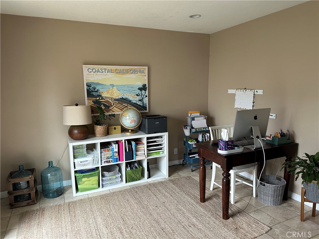 39 Wintermist Irvine, CA 92614 - Photo 9 of 14 a living room with furniture and a wooden floor