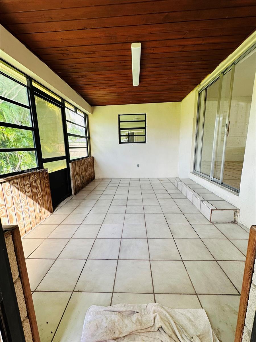 5705 Southwest 39th Street Miami, FL 33155 - Photo 21 of 26 a view of front door