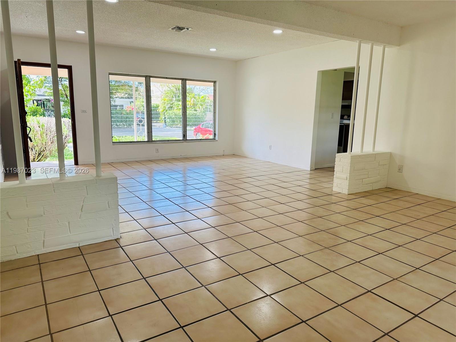 5705 Southwest 39th Street Miami, FL 33155 - Photo 10 of 26 a view of an empty room and window