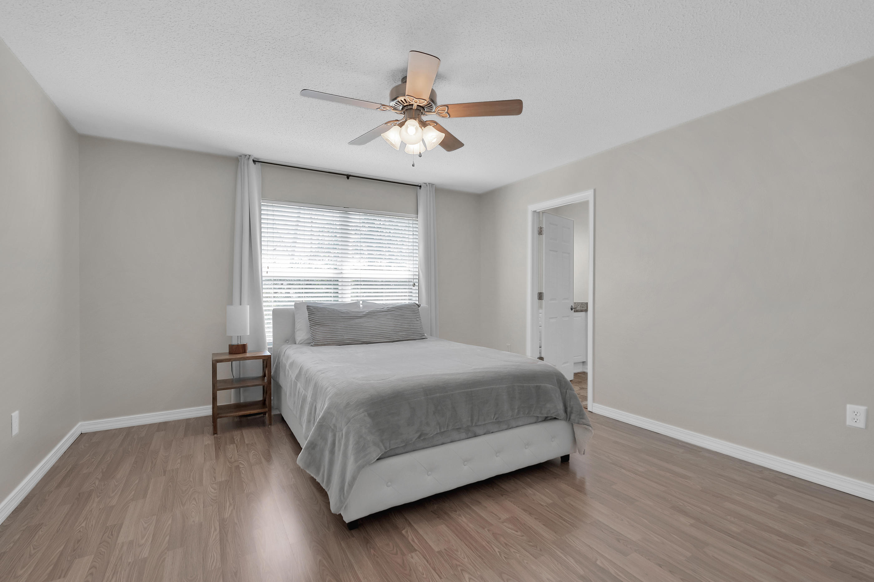 139 Sandstone Trail Crestview, FL 32539 - Photo 18 of 36 a bedroom with a bed and window
