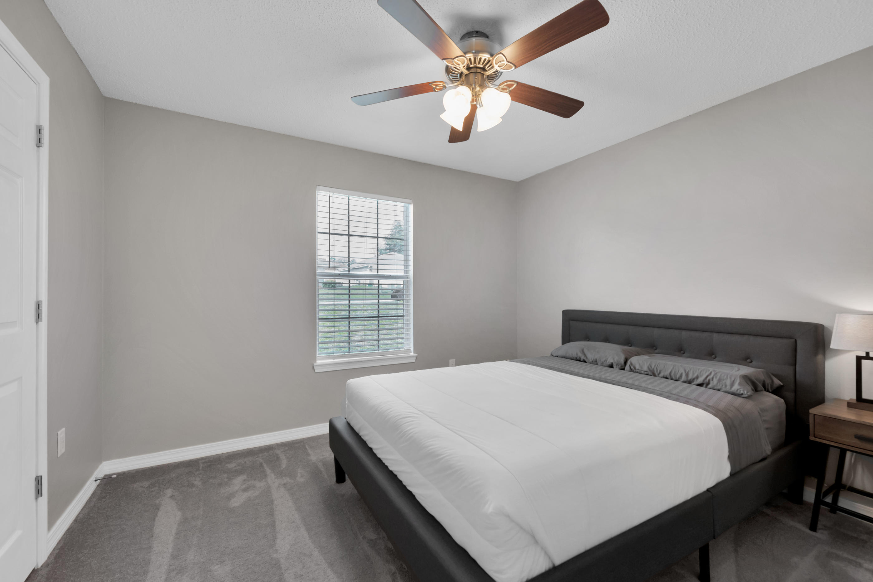 139 Sandstone Trail Crestview, FL 32539 - Photo 23 of 36 a bedroom with a bed and a window