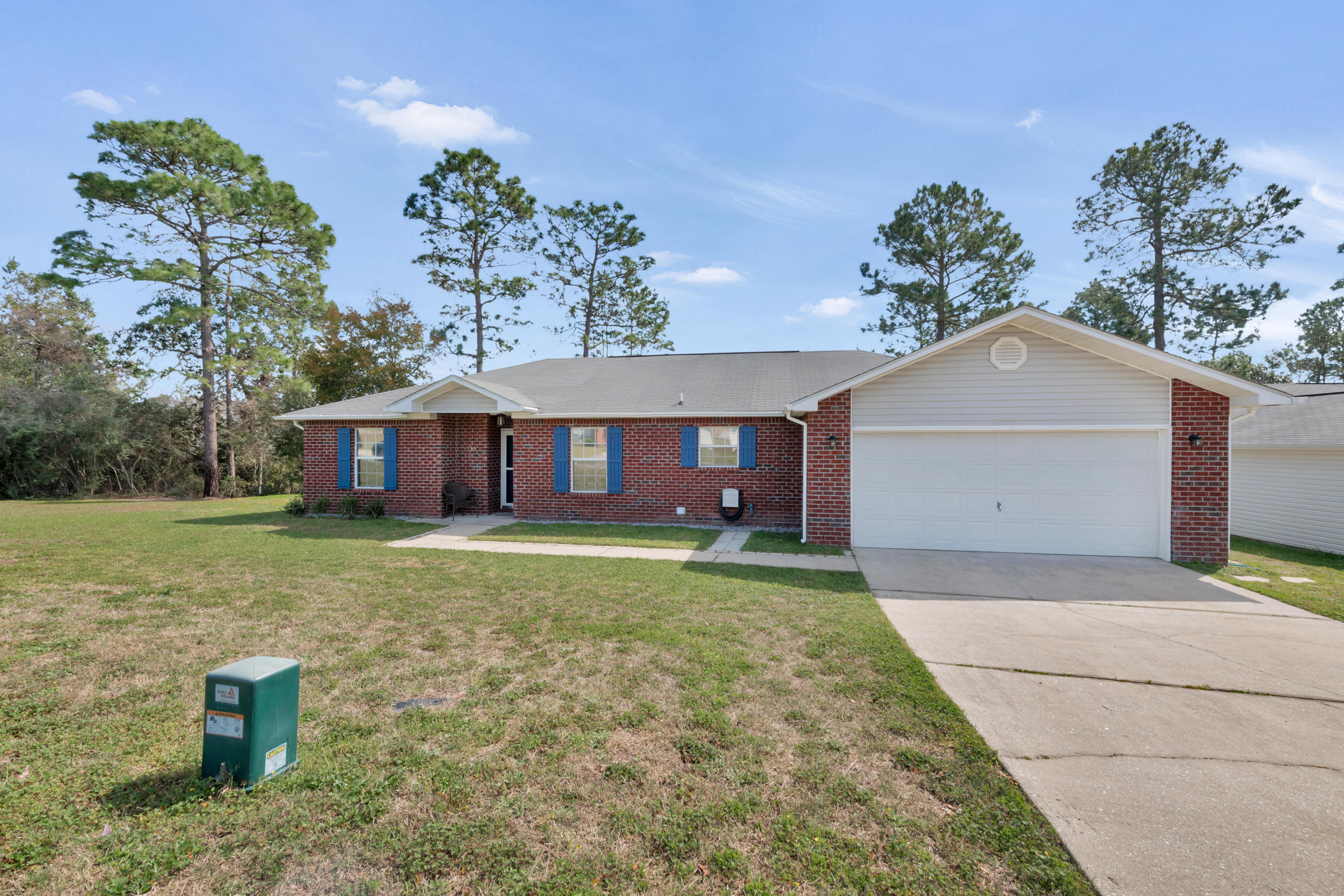 139 Sandstone Trail Crestview, FL 32539 - Photo 34 of 36 a front view of a house with garden