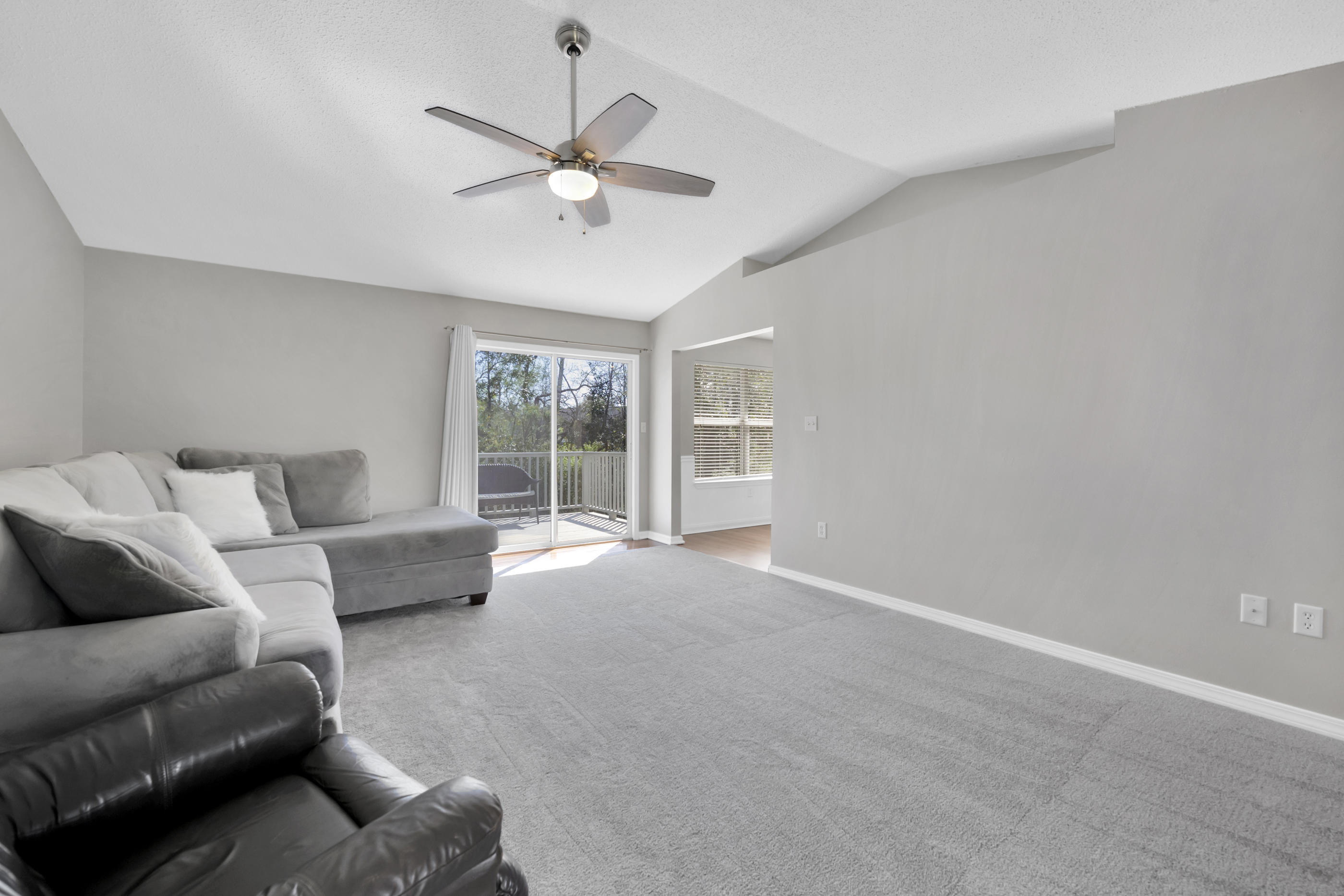 139 Sandstone Trail Crestview, FL 32539 - Photo 4 of 36 a living room with furniture and a large window