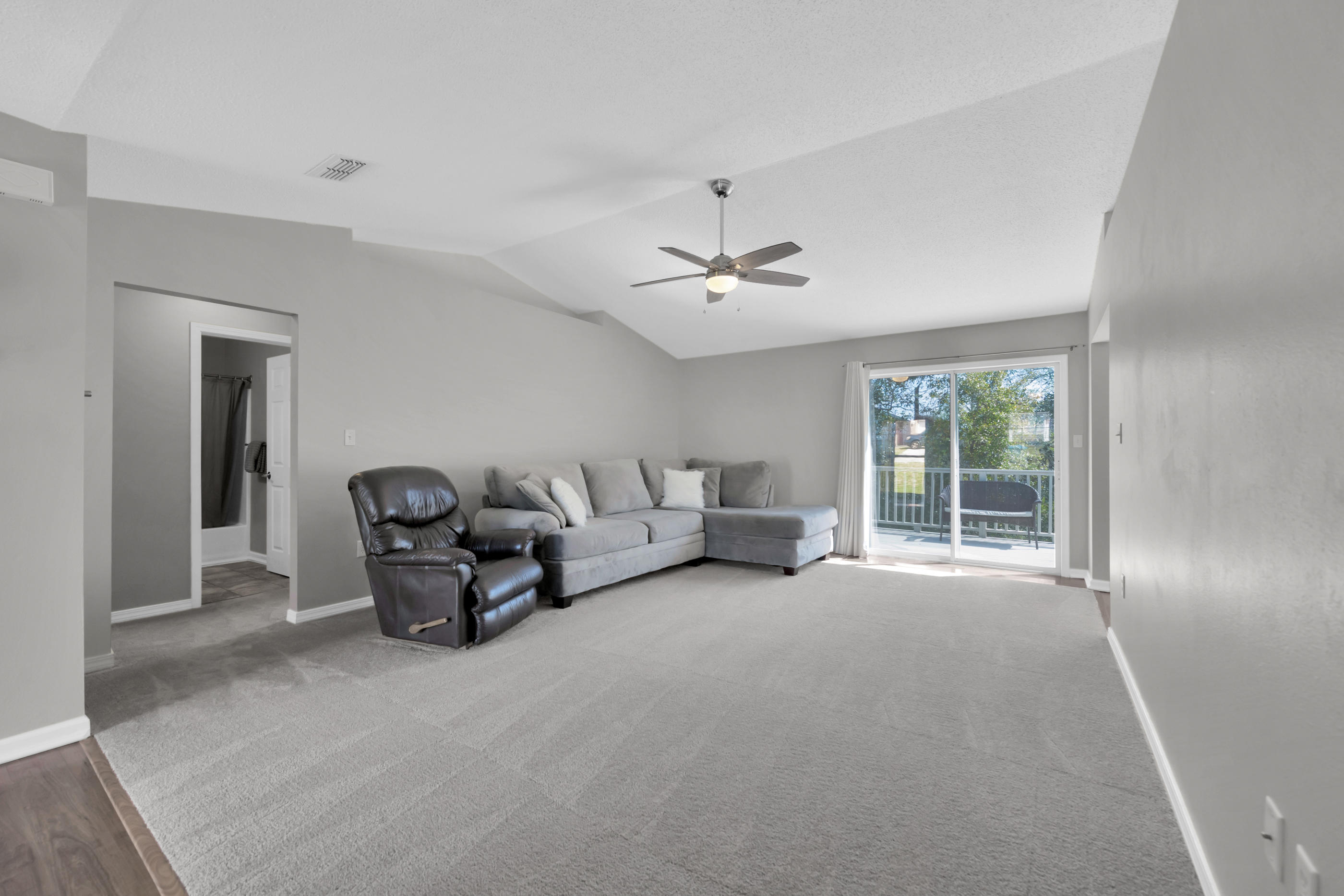 139 Sandstone Trail Crestview, FL 32539 - Photo 7 of 36 a living room with furniture and a window