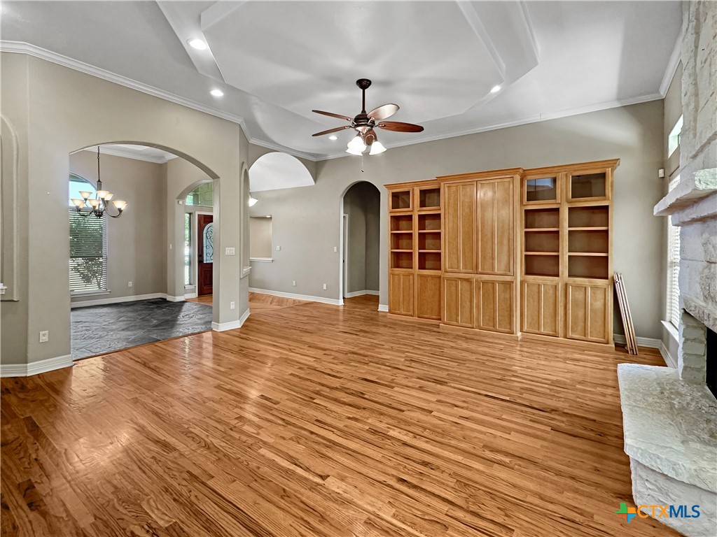 386 Wentworth Spring Branch, TX 78070 - Photo 5 of 39 a view of a livingroom with wooden floor and a ceiling fan