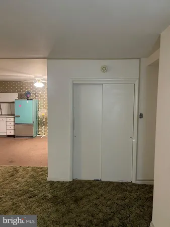 a view of a livingroom with furniture