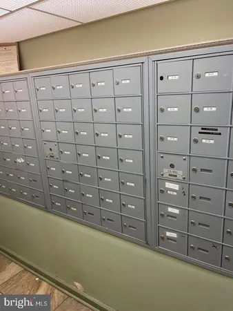 a view of a livingroom with an oven cabinets and a wooden floor