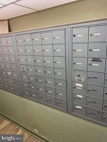 a view of a livingroom with an oven cabinets and a wooden floor
