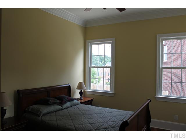 2108 Tulare Court Raleigh, NC 27612 - Photo 11 of 25 Downstairs bedroom ideal as guest suite with private bath Bedroom