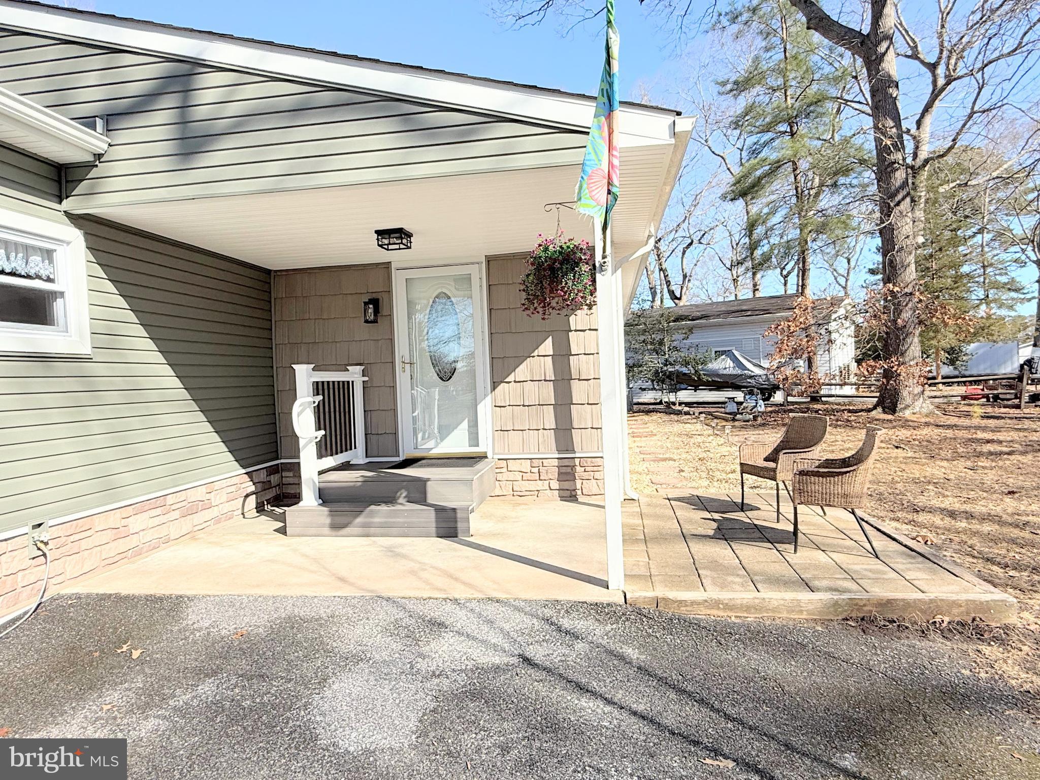 34479 Broad Water Road, Unit 644 Millsboro, DE 19966 - Photo 12 of 61 a view of a building with sitting area