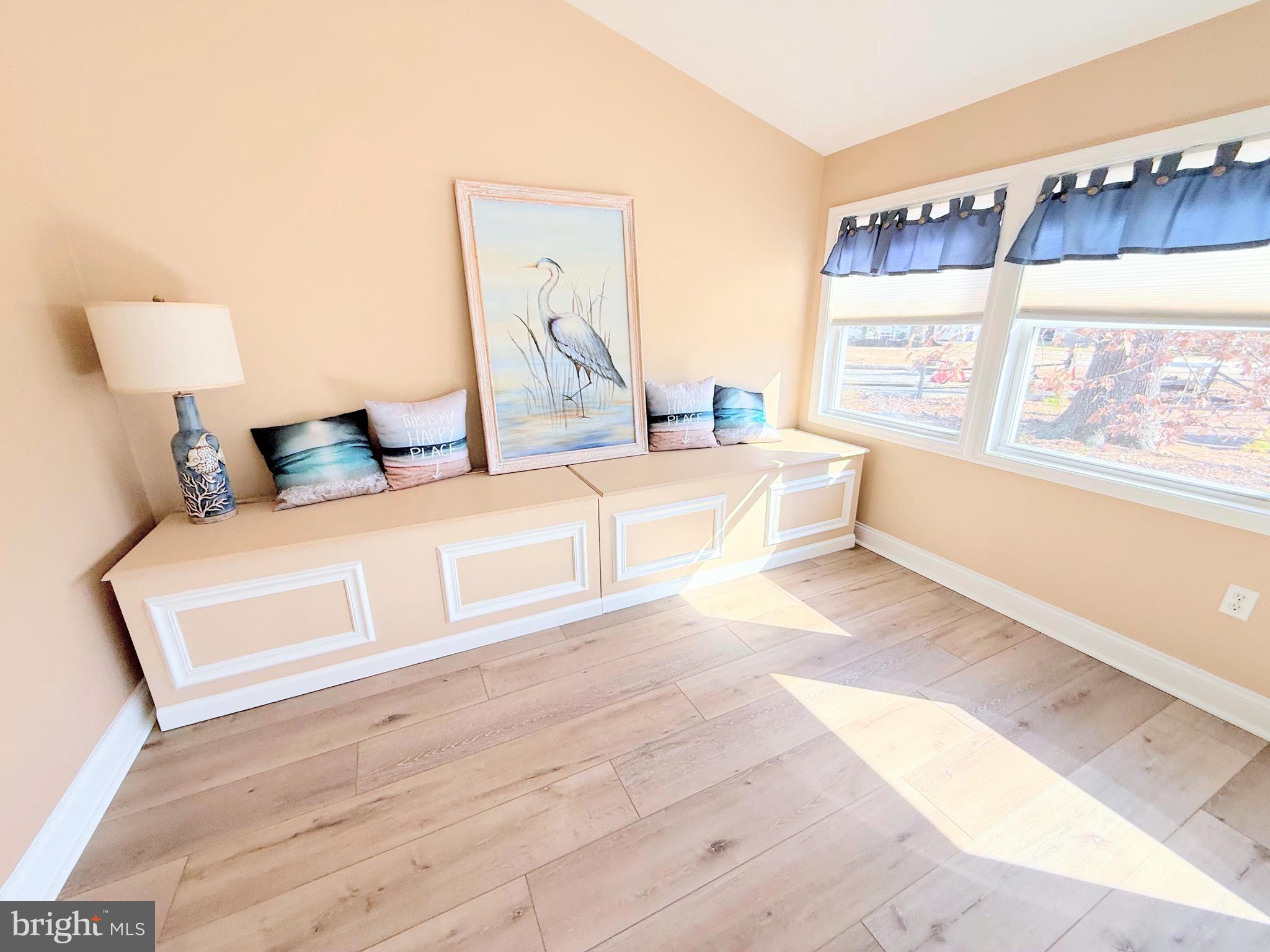 34479 Broad Water Road, Unit 644 Millsboro, DE 19966 - Photo 14 of 61 a living room with furniture and a large window