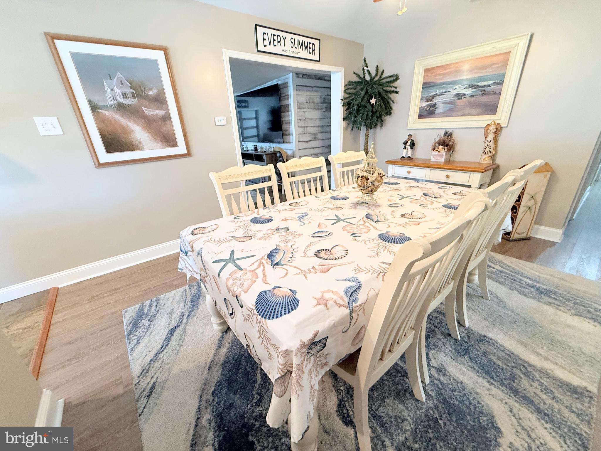 34479 Broad Water Road, Unit 644 Millsboro, DE 19966 - Photo 31 of 61 a dining room with furniture and window